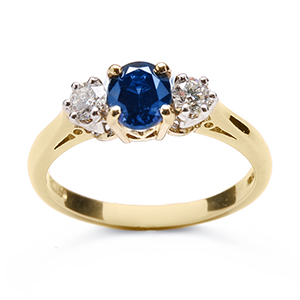 Oval Sapphire and brilliant cut diamond ring