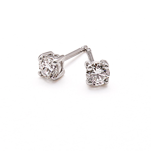 Four claw diamond studs in platinum