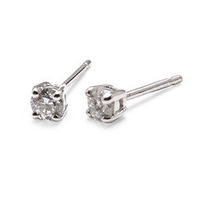 Four claw diamond studs in white gold